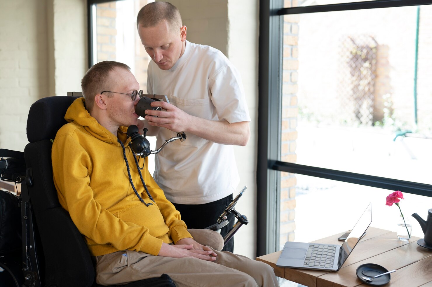 medium shot friend helping disabled man