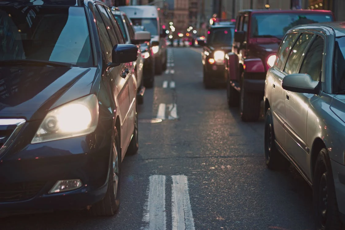 cars in traffic at dusk